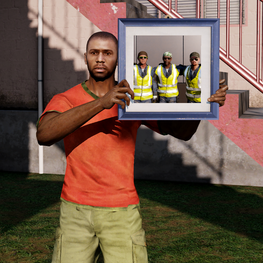 Lucas Bavadra holding a picture depicting his deceased brother